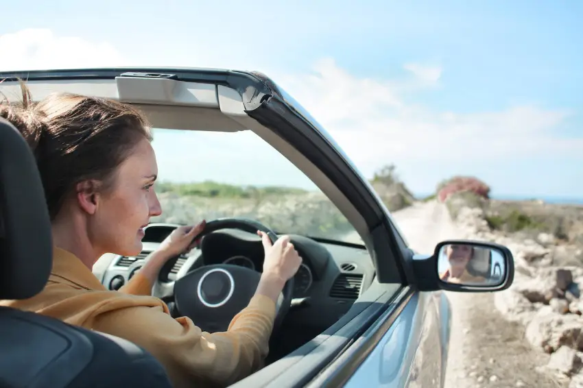 a woman driving car